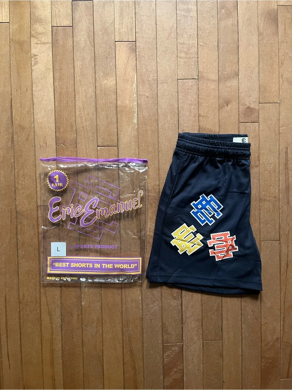 Eric Emanuel navy black with triple Eric emaunel logo Large